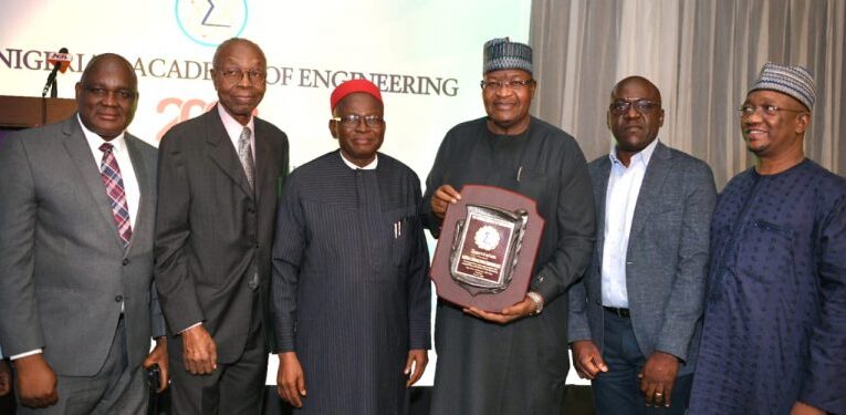 Danbatta Lifts Platinum Award For NCC’s Performance.